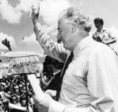 image of Gough Whitlam addressing the crowd at the front of Old Parliament House.